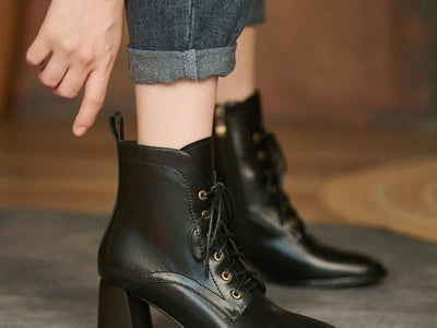 black high boots with low heel